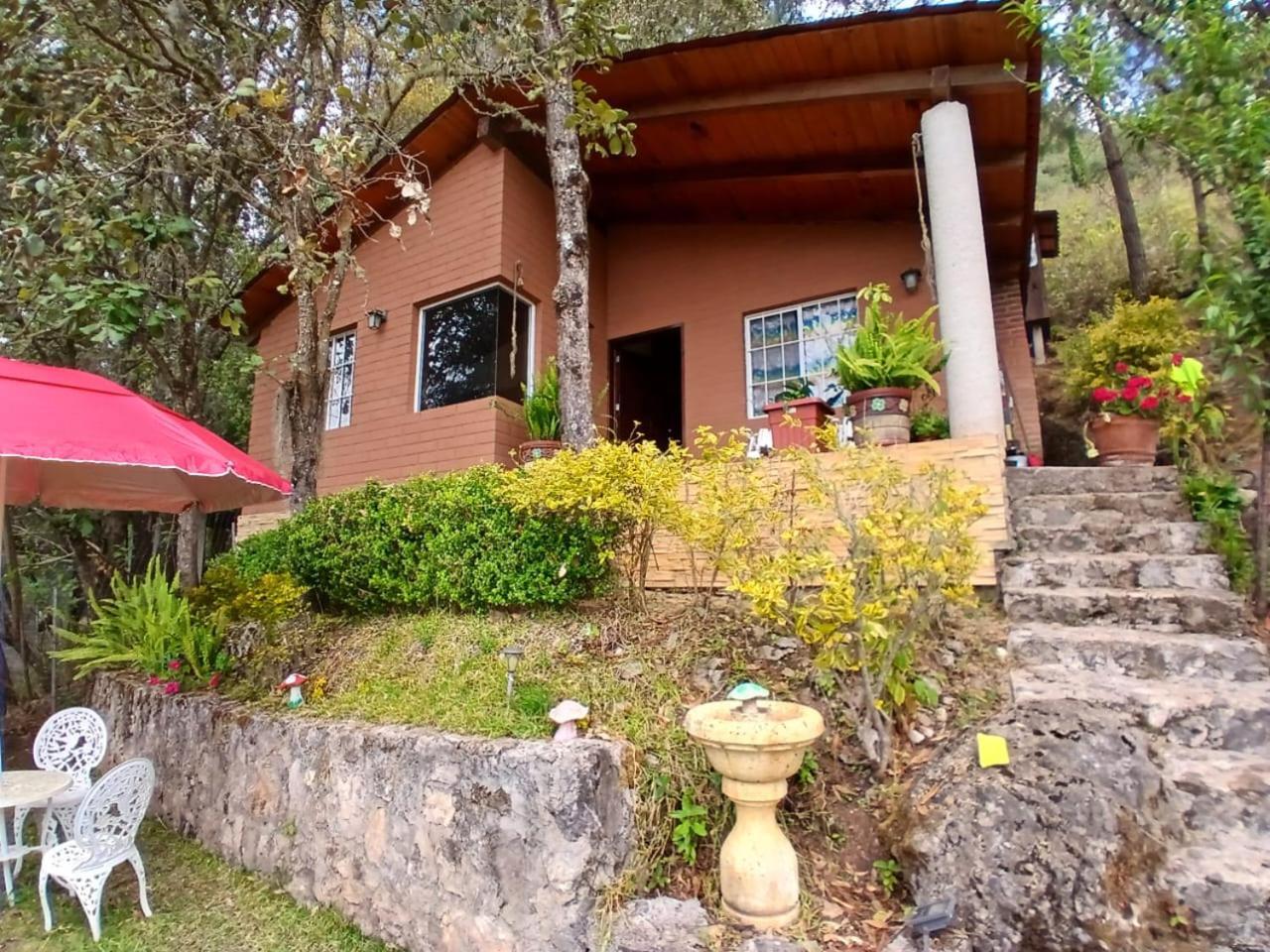 Cabana Con Banera Y Chimeneas En Puesta De Sol El Pacifico Exterior foto